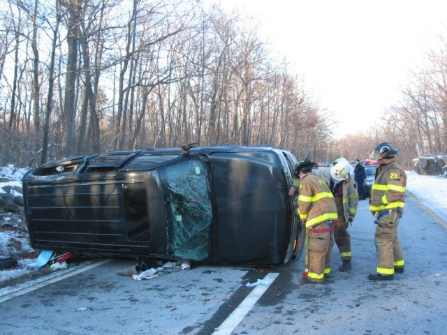 Firefighters gain access to engine compartment